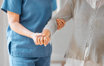 A caregiver assisting a resident A caregiver assisting a resident